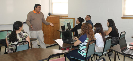 Professor lecturing in class.