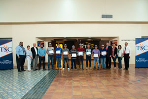 Recent graduates of the TSC Industrial Scaffolding program receive certificates of completion and an Industrial Scaffolding Committee Industry credential certifying their qualifications for employment.