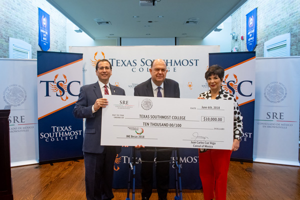 The Mexican Consulate in Brownsville presented Texas Southmost College with a $10,000 check from the IME Becas program for TSC students on June 6, 2018. From left, From left, TSC President Jesús Roberto Rodríguez, Ph.D., General Consul Juan Carlos Cué Vega, and TSC Board Chair Adela G. Garza.