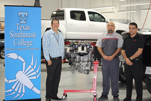 Toyota Brownsville donated a BMW engine to TSC’s Auto Technology Program on June 22, 2016. From left, TSC Auto Technology Program Instructor Rolando Uresti, Toyota Brownsville Shop Foreman Michael Schoonover and Sales Manager Ricardo García.